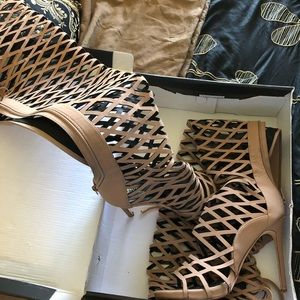 Thigh high heeled sandals